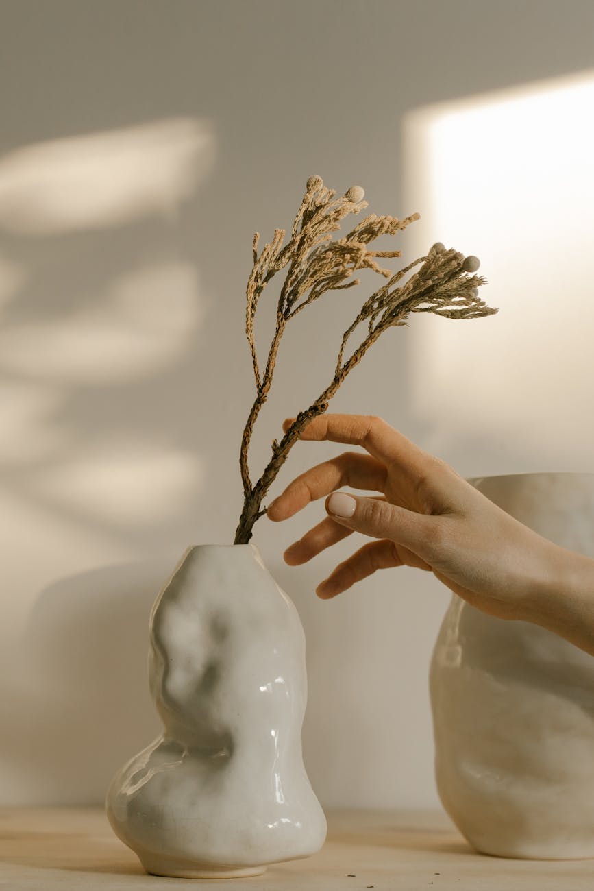 stem in white ceramic vase